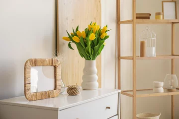 Outdoor-Kissen Beautiful vase with tulips on chest of drawers in living room © Pixel-Shot
