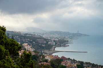 Fototapeta na wymiar Panoramic aerial view of Malaga in a cloudy summer day in the morning in Malaga, Spain