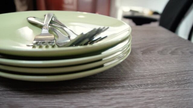 cutlery on a green plate