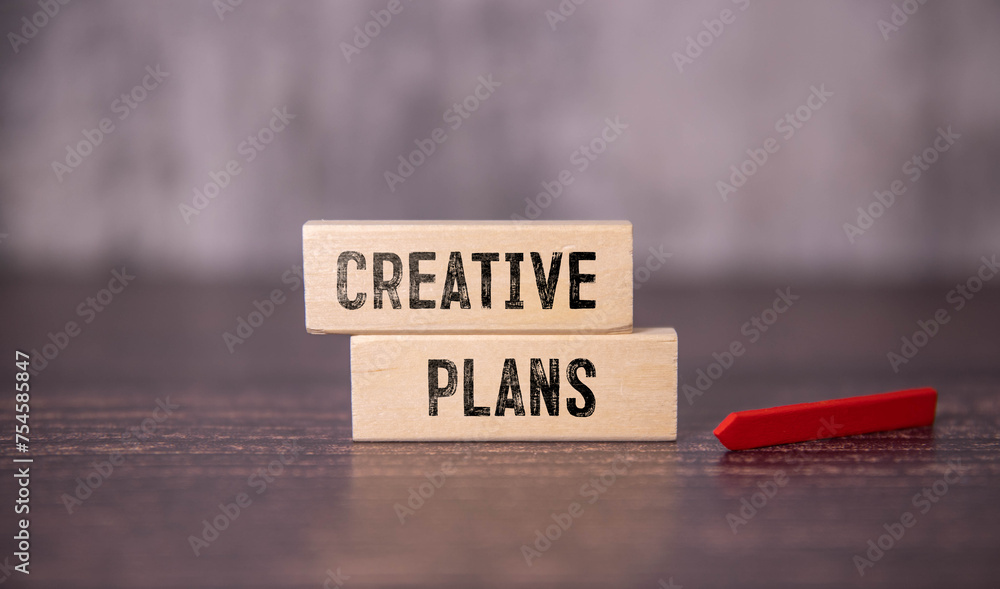 Aufkleber strategy plan text on a paper clipboard with chart and notebook