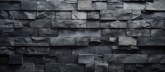 A dark grey stone tile texture brick wall is prominently featured in this black and white image....