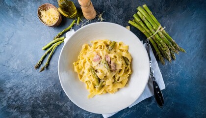 high quality photo . Vegetarian pasta carbonara with green asparagus; healthy vegetarian - 754589898