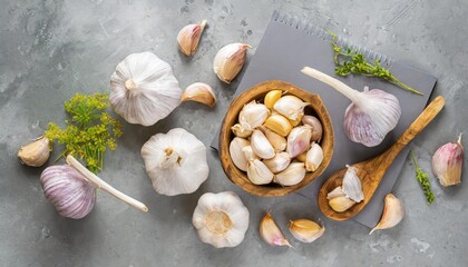 Obraz na płótnie Canvas high quality photo . Whole and broken garlic bulbs, cook book idea for chopping vegetables