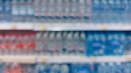 supermarket aisle and shelves blurred background. grocery store retail business concept