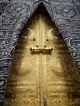 Replica the golden doors of the Holy Kaaba closeup, covered with Kiswah. Massive lock on the doors. Entrance to the Kaaba