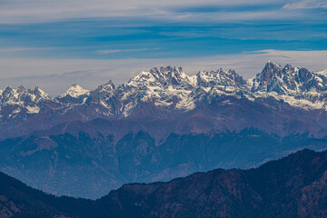 Jagged Peaks of the Himalayas Overlooking the Valleys from Murma Top, Nepal