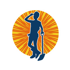 Silhouette of a female wearing worker costume in action pose with shovel tool.