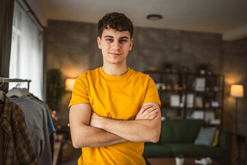 Portrait of young caucasian teen male young man stand at home