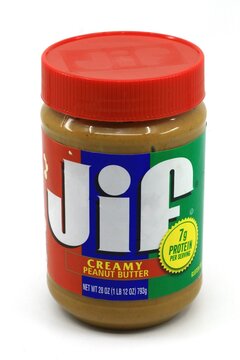Jif Peanut butter jar. The product is made by The J.M. Smucker Company.  Orrvile, Ohio, USA - March 12
