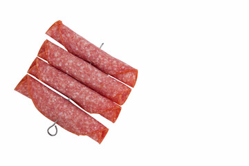 Salami smoked sausage slices on background