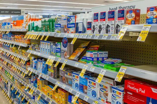 NEW ORLEANS, LA, USA - MARCH 20, 2021: Shelves Displaying Back Pain Medications and Treatments Inside a Walgreen's Drugstore 