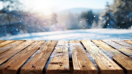 Naklejka na ściany i meble Wooden table top with copy space. Snowy landscape background