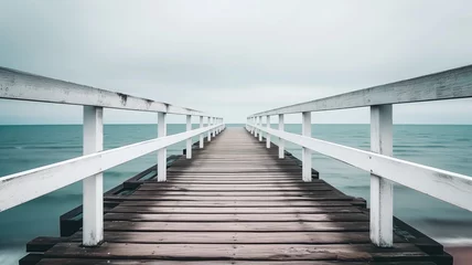 Fotobehang Serene wooden pier extending into a calm sea under cloudy skies © Татьяна Макарова