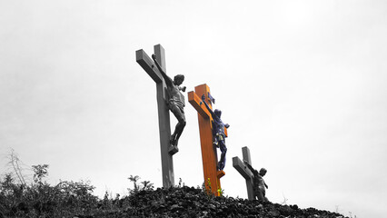 Three Crosses of Jesus Christ on top of the hill in black and white background. Holy week of Easter concept. Good Friday backgrounds. Christianity.