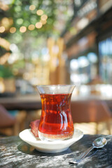 Traditional turkish tea on white table .