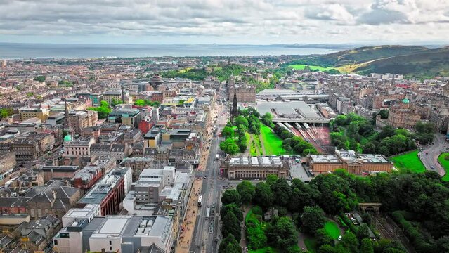 Aerial view of Spirelike Victorian Scott Monument in Edinburgh, Scotland. Gothic monument built in honour of the Scottish writer, 200 feet Tower in Princess Street Gardens, Edinburgh, Scotland.