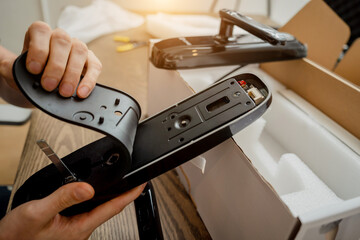 A technician assembles and installs smart electronic door lock for house protection