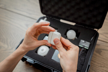 A technician works with a demo kit of the smart home system