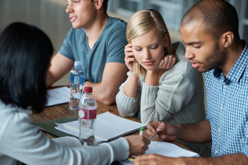 Education, university and students in study group for learning, working together on project and research. Paper, writing and academic discussion for assignment on campus, diversity and scholarship