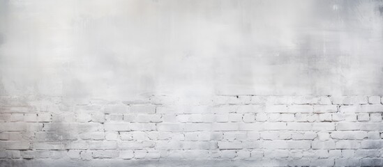 Obraz premium A black and white brick wall covered in a white mist, creating a textured and abstract background.