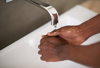 Sink, water and washing of hands for hygiene, bacteria and cleaning virus for healthcare. African...