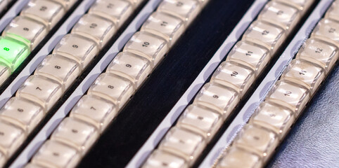 Keys on a mixing console. Close-up