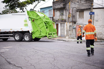 Teamwork, truck and garbage collection for cleaning and disposal in waste management or trash. Dumpster refuse, cleanup by sanitation workers for rubbish removal and environmental sustainability