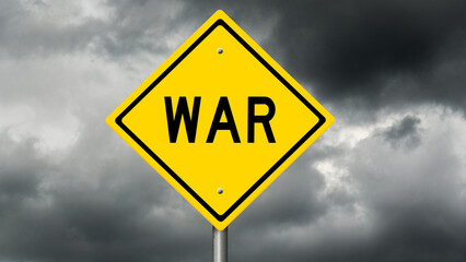 Yellow highway warning sign with dark storm clouds in the background and the word WAR
