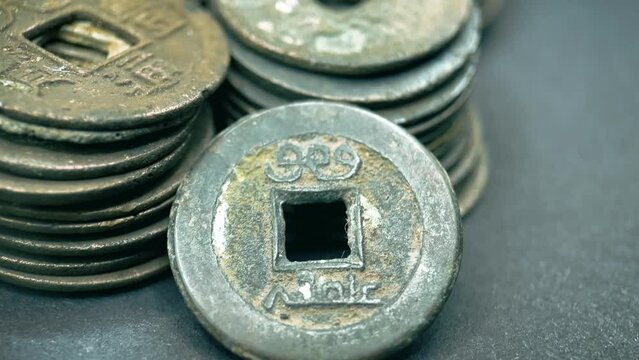 Ancient Chinese coins from the Qing dynasty.