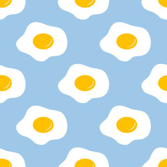 Seamless pattern cute fried eggs on blue background. Vector illustration.