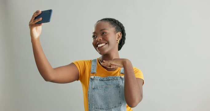 Studio, peace sign or happy black woman in a selfie on social media with confidence, post or smile. African lady, memory or influencer taking a photograph, vlog or picture online on grey background