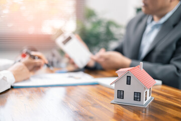 Explain and present information about home and mortgage purchases. Real estate agents bid homes in...