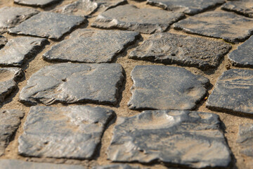 close up of cobblestones in the sunshine