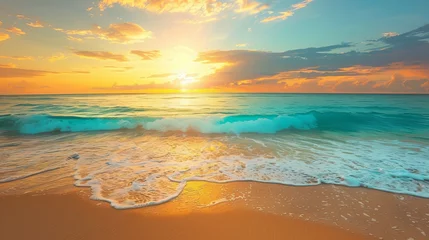 Photo sur Plexiglas Coucher de soleil sur la plage Vibrant Beach Sunset with Waves and Clouds The sun dips below the horizon, illuminating clouds and waves on a beautiful beach with vibrant orange and blue tones.  