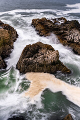 waves crashing on rocks