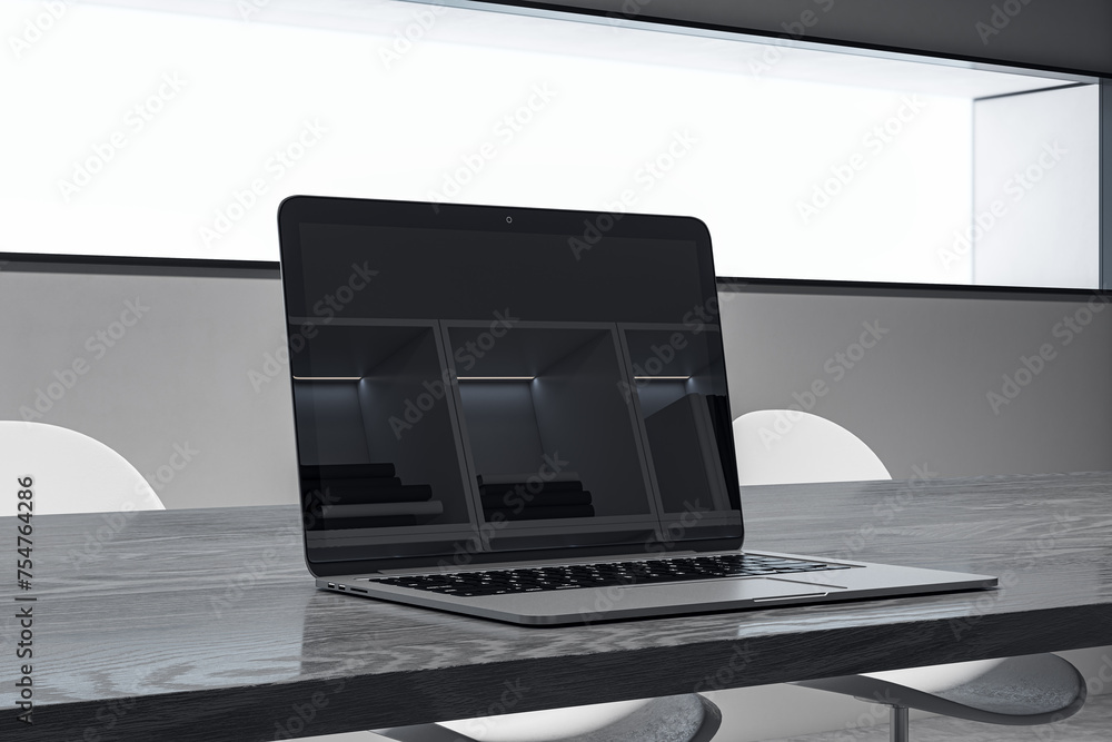 Poster close up of laptop screen with reflections on wooden office desk. workplace and technology concept. 