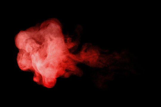 red smoke steam spray, and abstract vapor water isolated on a black background. concept of texture cold mist or hot vapor, fog effect, and cloud for design air pollution, element smog, dust
