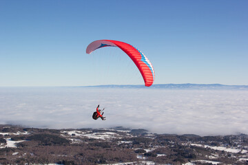 Paragliding. Paragliding in Auvergne. paragliding flight in the mountains in France. Paragliding...