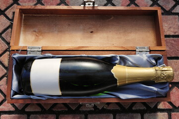 bottle of wine in a wooden presentation box