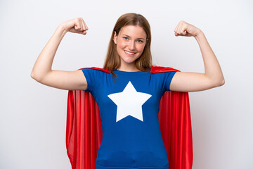 Young caucasian woman isolated on white background in superhero costume and doing strong gesture