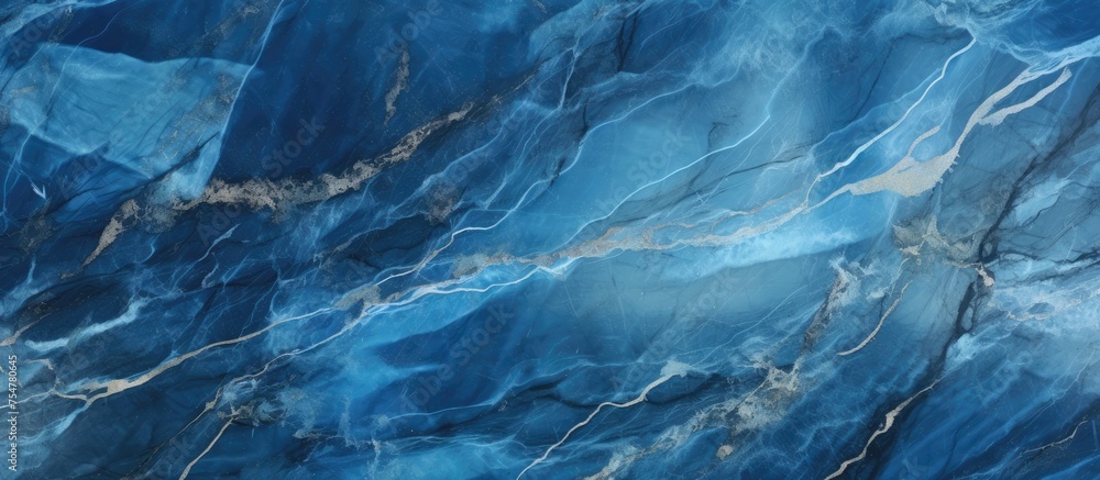 Poster detailed view of a blue marble surface, showcasing intricate patterns and textures found in the ston