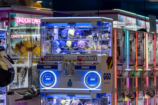 Tokyo, Japan, November 6, 2023: Arcade Claw Machine with Anime Plushies.