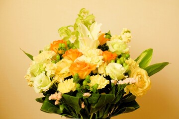 orange and yellow flowers in the vase