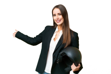 Young Asian woman with a motorcycle helmet over isolated chroma key background extending hands to the side for inviting to come