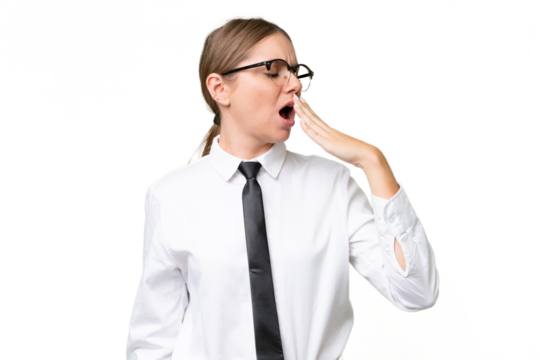 Young business caucasian woman over isolated background yawning and covering wide open mouth with hand