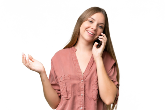 Young beautiful blonde woman over isolated background keeping a conversation with the mobile phone with someone