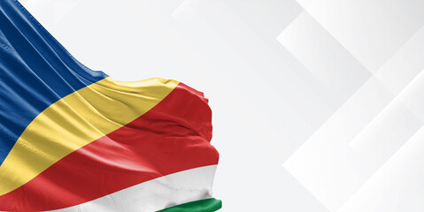 Seychelles national flag cloth fabric waving on beautiful white Background.