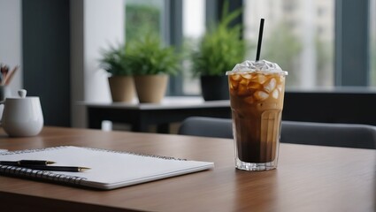 Iced coffee in glass on table in coffee shop, stock photo