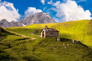 Little church or chappel in Dolomite mountains in summer