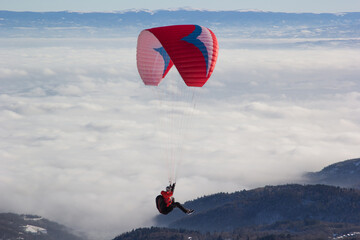 Paragliding. Paragliding in Auvergne. paragliding flight in the mountains in France. Paragliding...